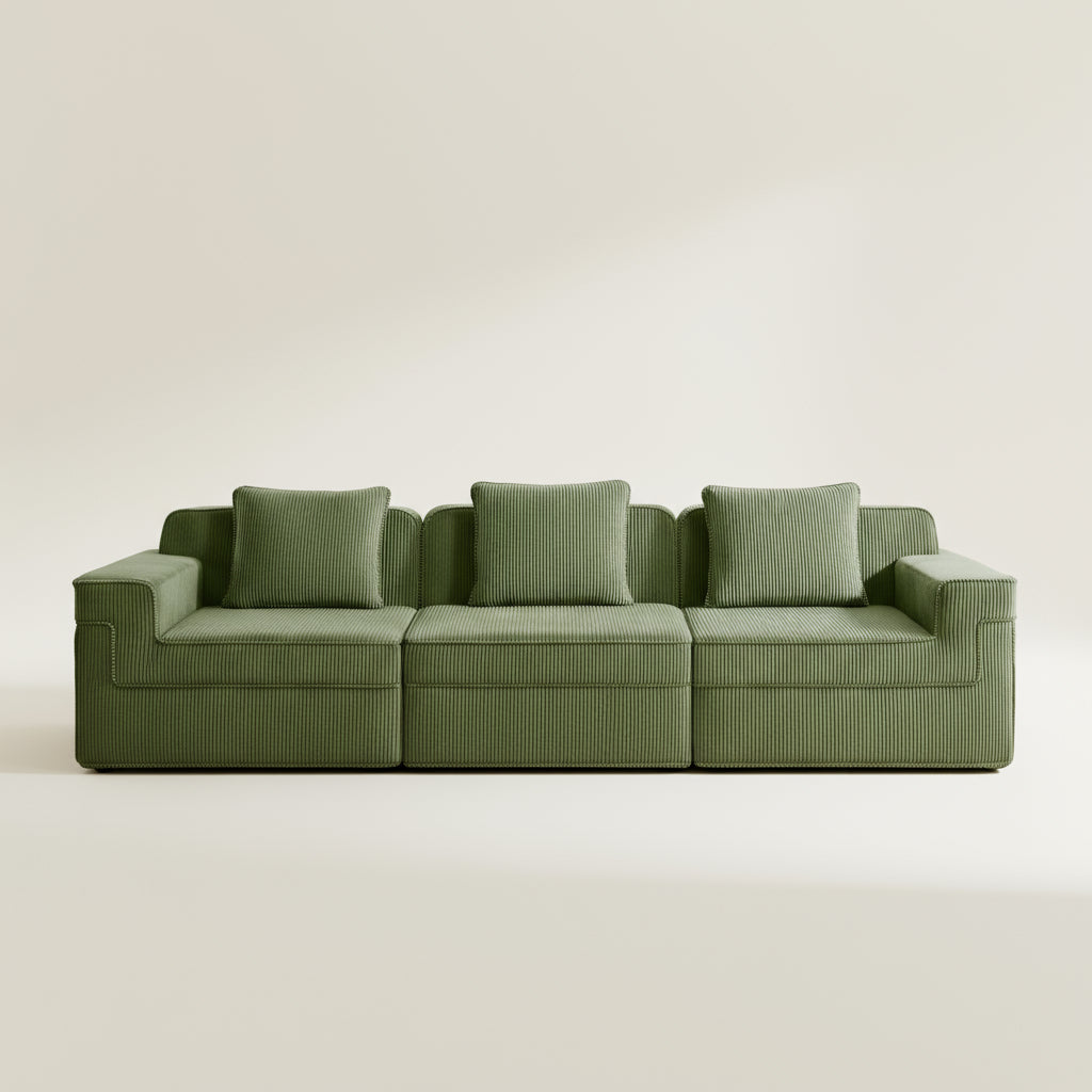 studio shot of the olive green boneless couch from two seventy nine showing the rich corduroy texture and the three sofa seats