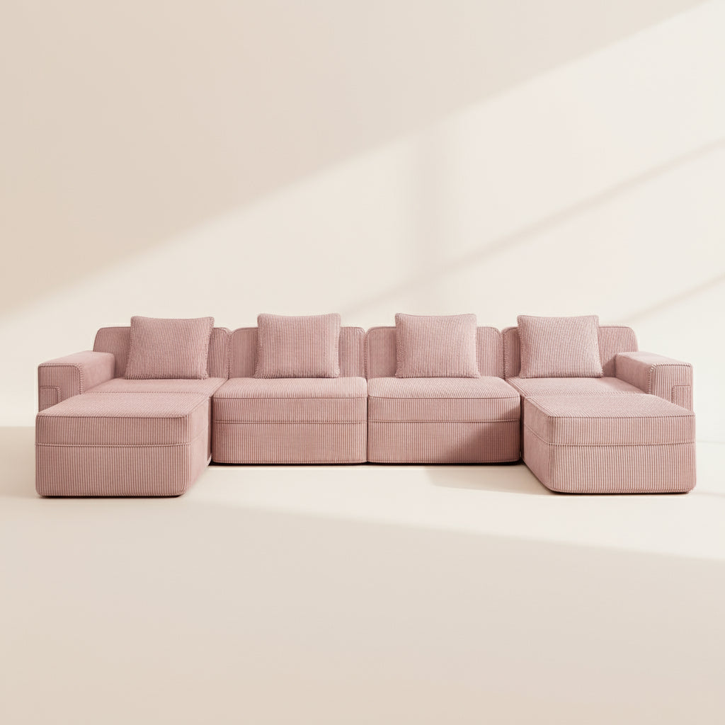 studio shot of the boneless couch in pink corduroy showing the detailed fabric color and texture as well as the comfort of the sofa