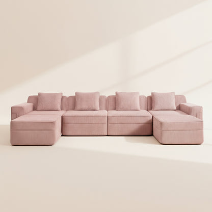 studio shot of the boneless couch in pink corduroy showing the detailed fabric color and texture as well as the comfort of the sofa
