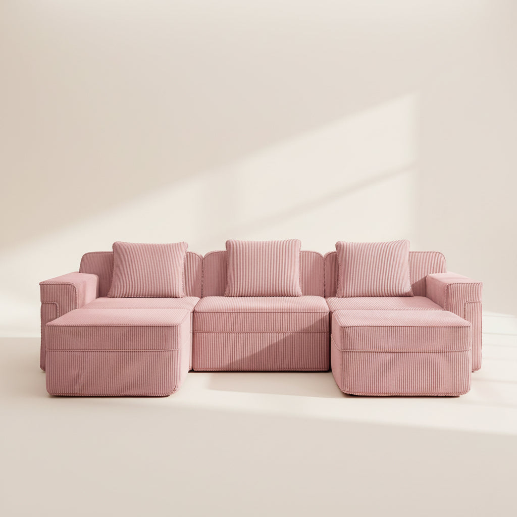 commercial studio shot of the pink boneless couch with two ottomans and three seats showing rich color and textured corduroy