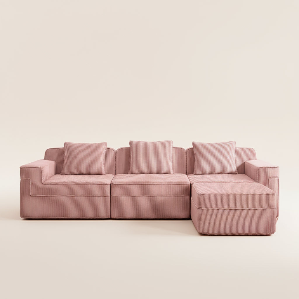 studio photography of the boneless couch in pink showing the corduroy upholstery as well as the texture and comfort of the three seat sectional