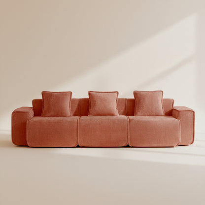 studio shot of the seneca boneless couch three seater in terracotta velvet