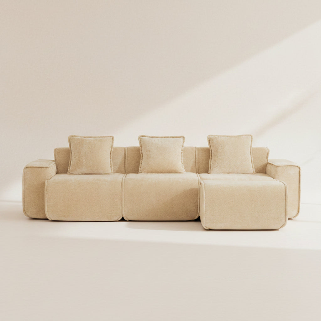studio shot of the seneca boneless couch three seater with one ottoman in camel velvet