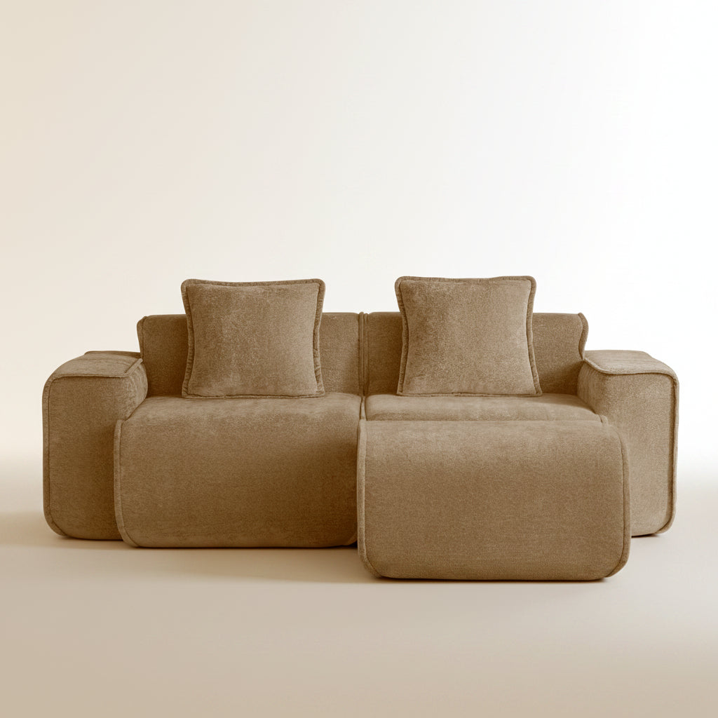 studio shot of the seneca boneless couch with ottoman in mocha