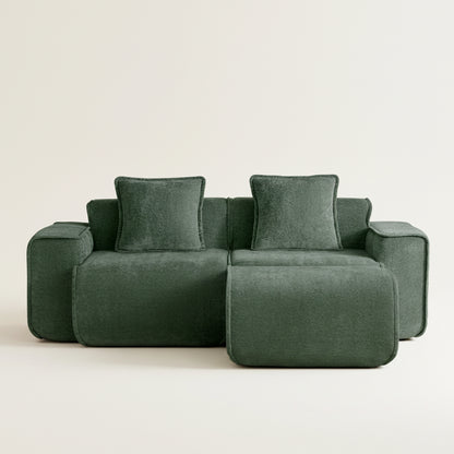studio shot of the seneca boneless couch showing its lush olive velvet upholstery two seats and one ottoman