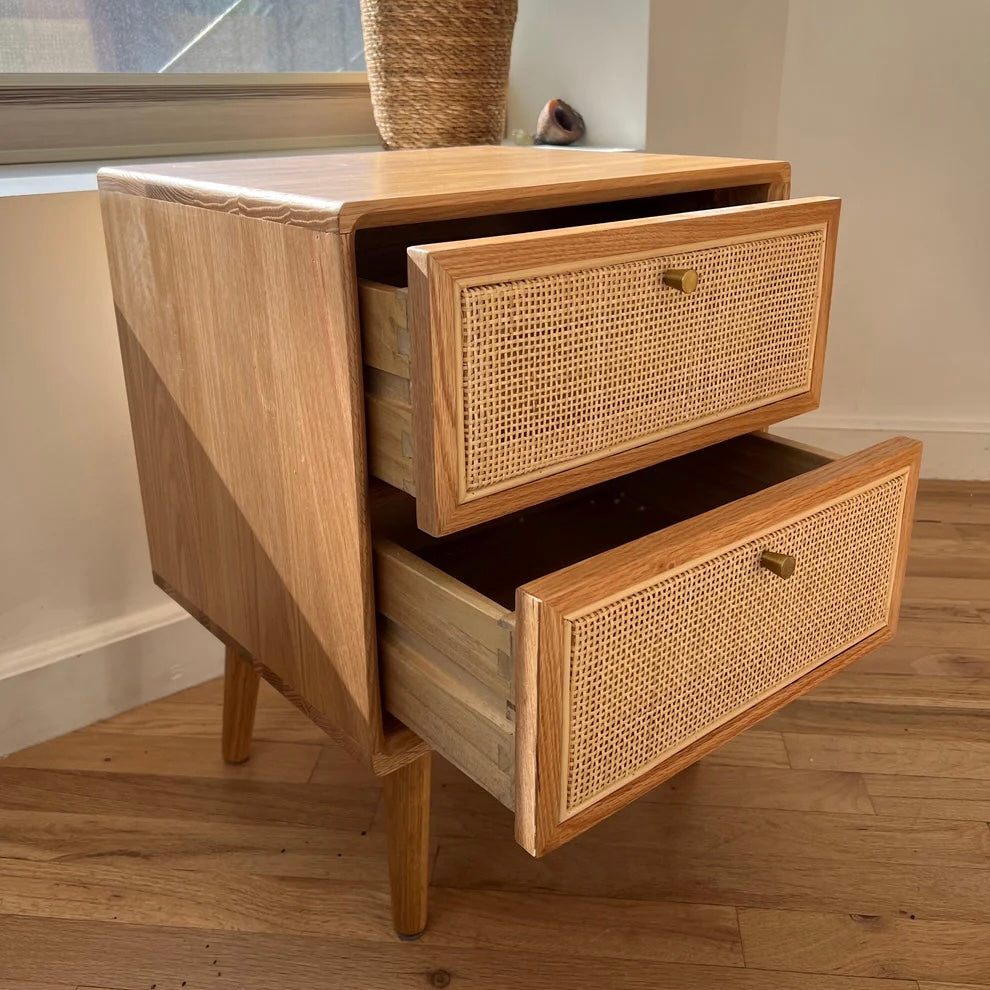 solid red pine nightstand with wooden drawers opened showcasing the rattan accents