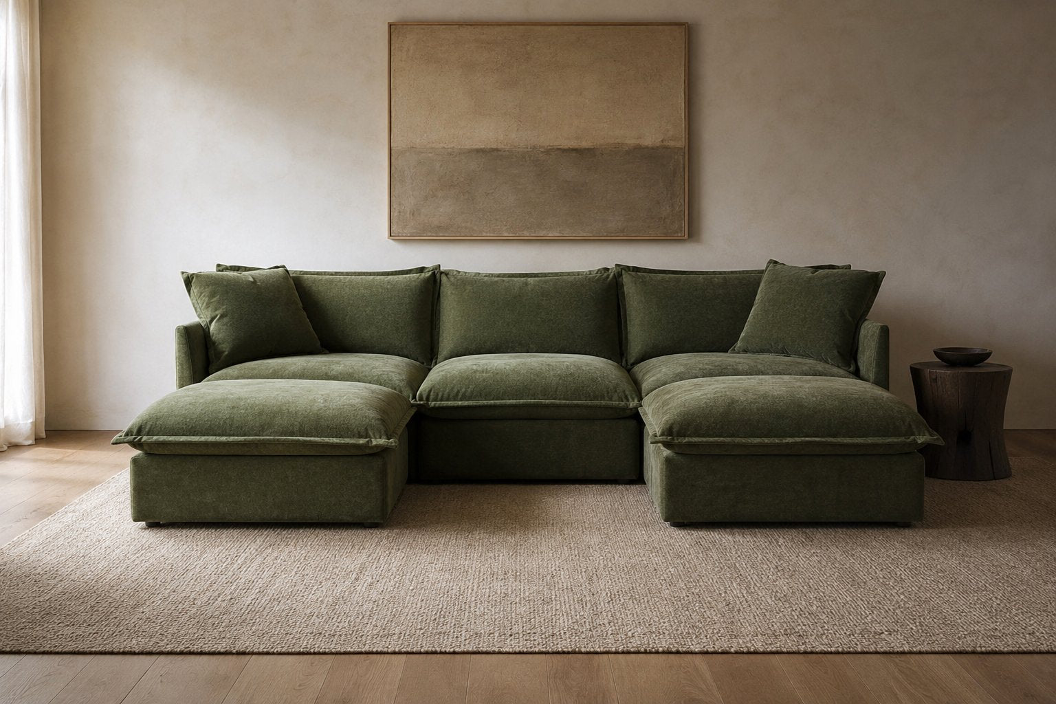 Olive green washable modular sectional sofa with chaise ottomans in a warm minimalist living room